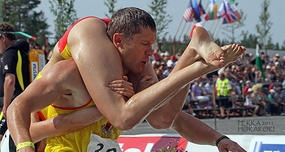 Wife-Carrying Championship in Finland Gives Winners Wife's Weight in Beer